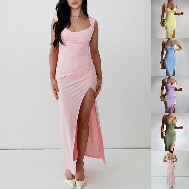 Rochie slim fără mâneci cu fentă și fundă decorativă la spate. Material ușor, croială rafinată -